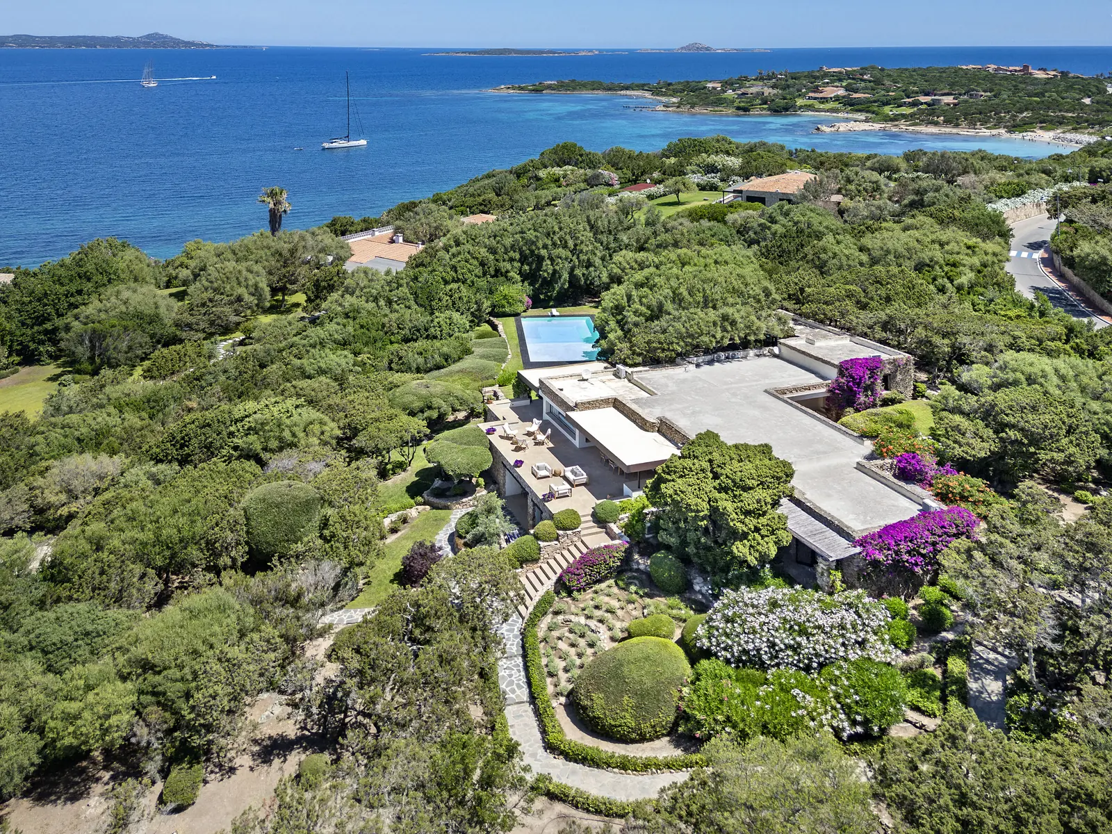 The Costa Smeralda coastline from above, with the villa and the turquoise sea